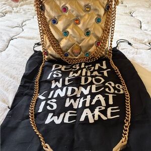 Kurt Geiger Kensington embellished quilted leather drawstring crossbody bag